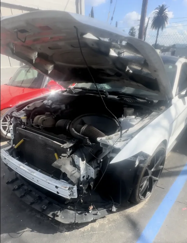 Before - auto body repair on Front-End Collision - Ford Mustang at Focus On Cars body shop, San Bernardino CA